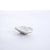 Silver decorative object on a light gray background