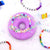 Purple Bracelet Donut Bath Bomb - The perfect gift for your BFF! Made with natural ingredients. Hand pressed with shea butter and epsom salt each donut bath bomb is packaged with a colorful, trendy beaded word bracelet inside a pouch bag. Topping and color of donut may slightly vary. Bracelet wording and color can vary. Bracelet in the picture is just an example. Bracelets are random.  Hand-pressed with epsom salt and shea butter.   Ages 3+ due to small parts