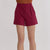 Garnetshorts worn by a person on a plain background